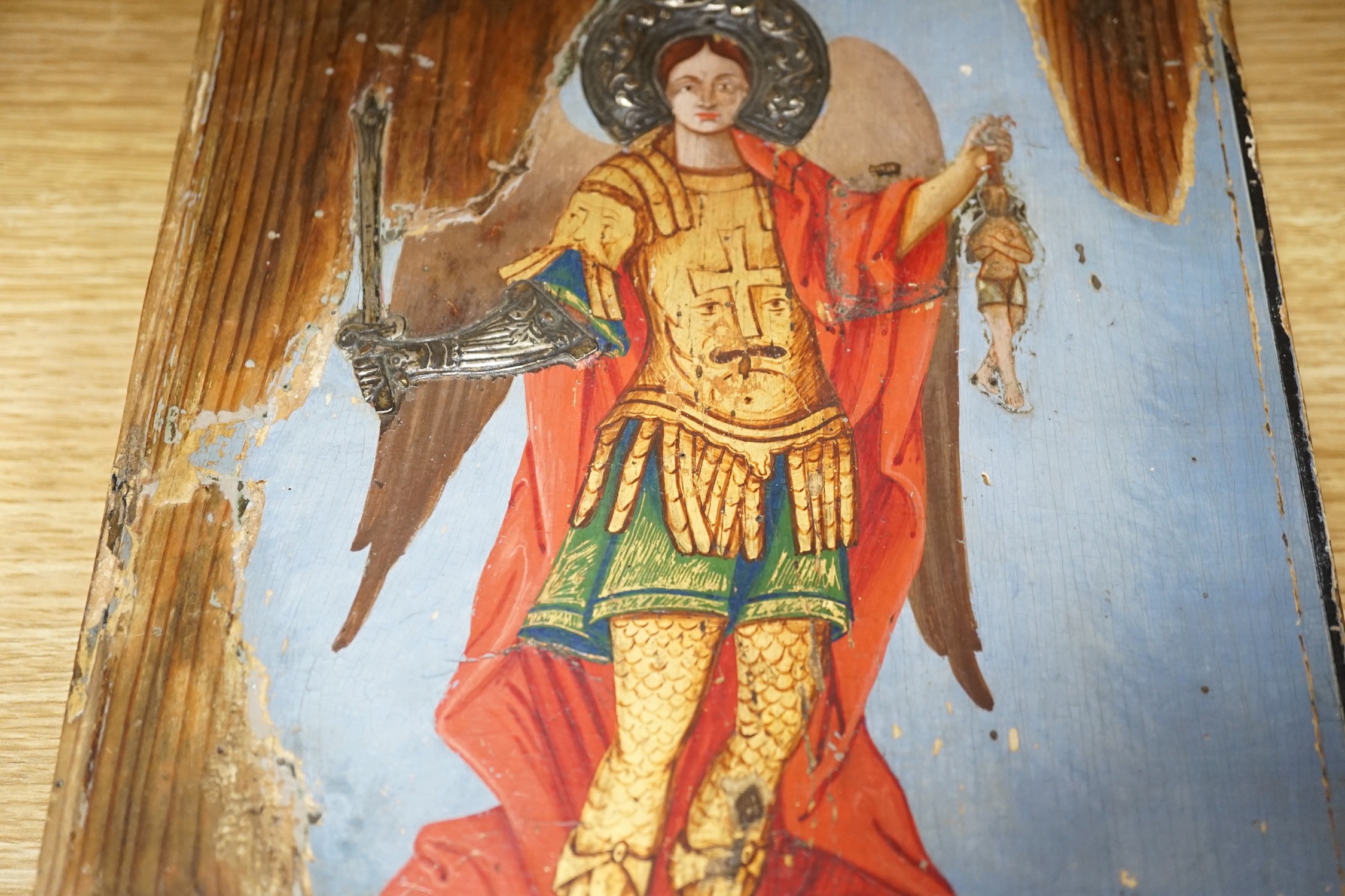 Two polychrome icons, largest 30cms high